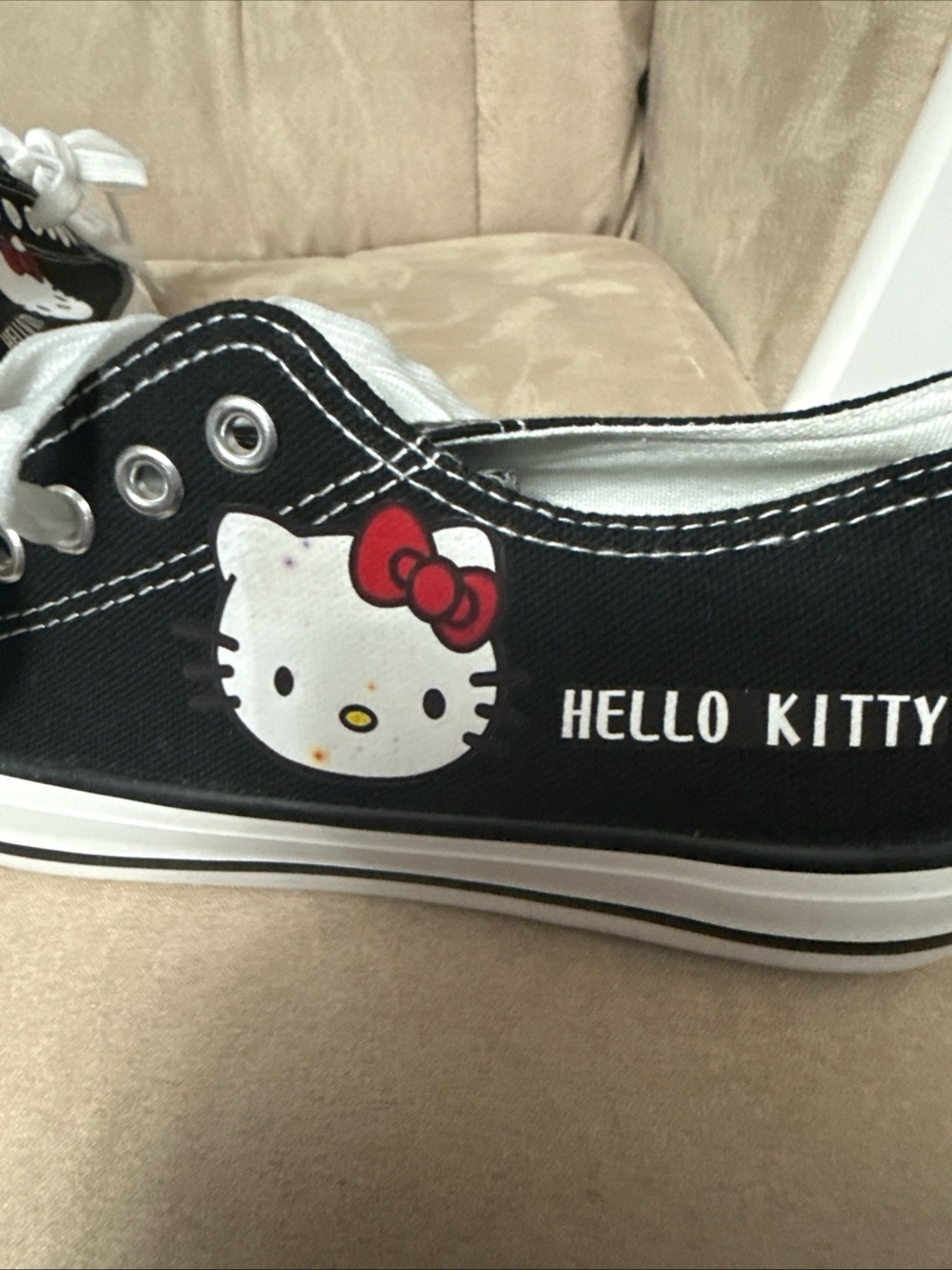 Hello Kitty Black Canvas Sneakers with White Laces and Red Bow Detail - Picture 3 of 8
